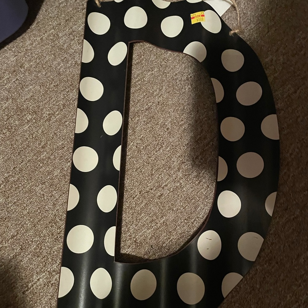 Hanging letter “D”